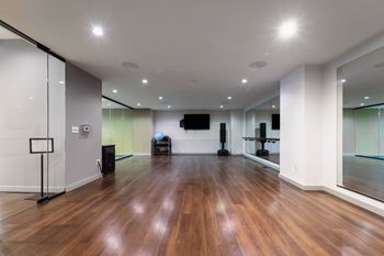24/7 Fitness center with yoga studio